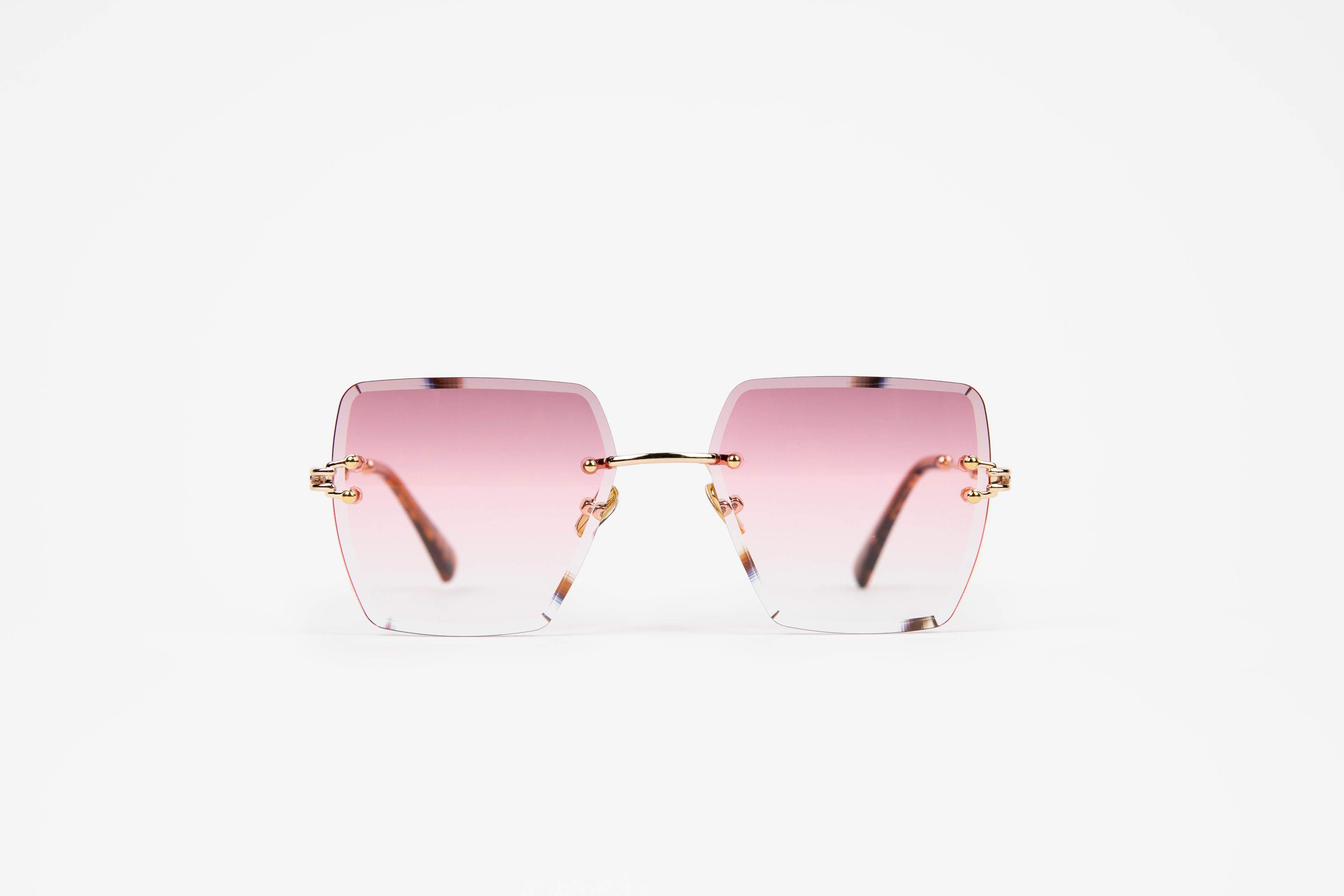 pink rimless square sunglasses